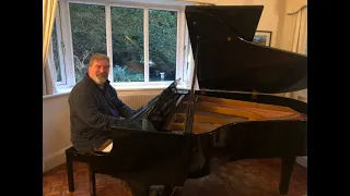 Phil Dickson playing the piano